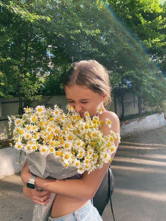 Corporate meeting room with carefully timed floral arrangements that maintain elegance throughout business hours